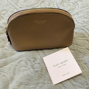 Kate Spade mini cosmetic case, blush colored, like new